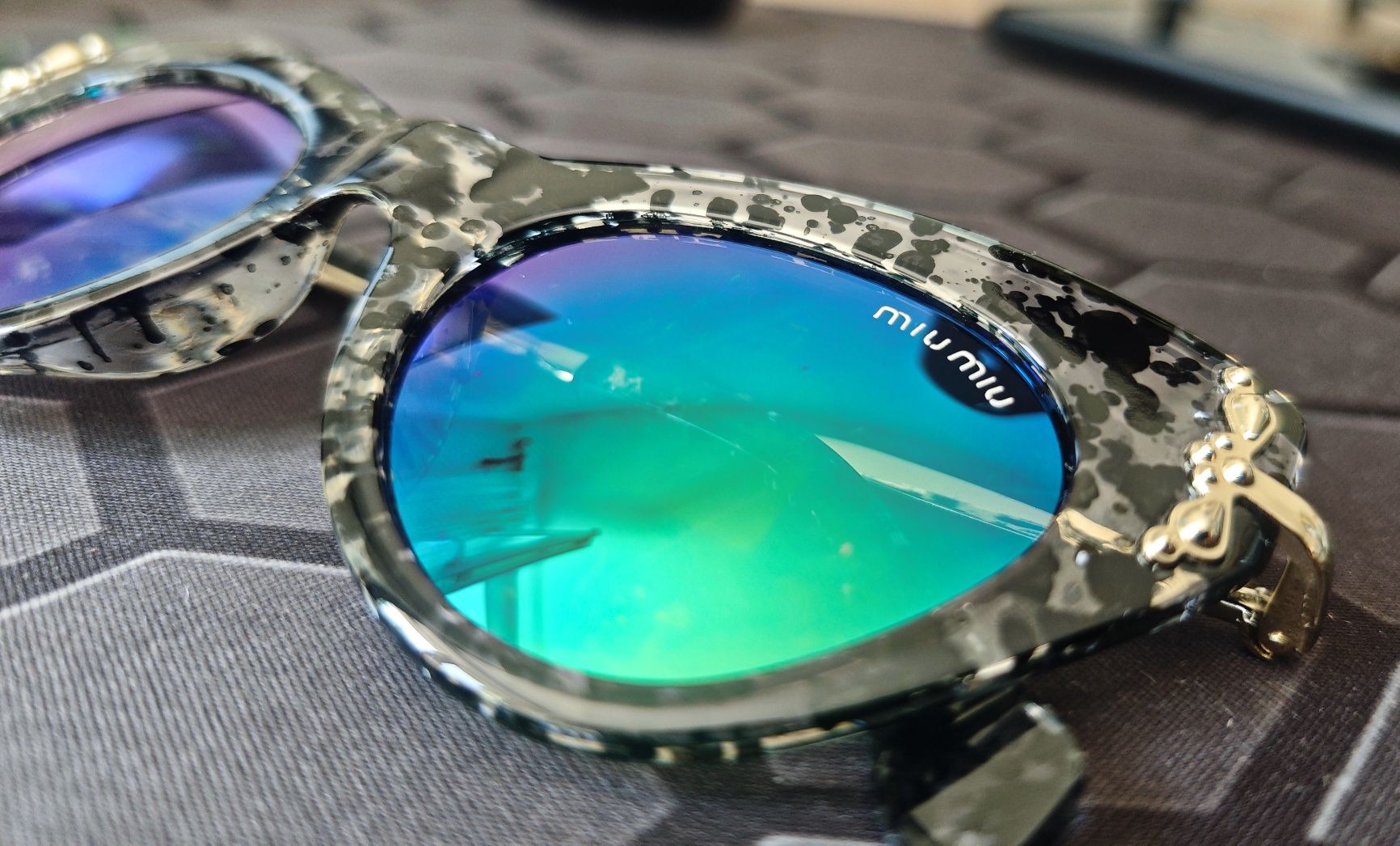 Damskie okulary Miu Miu