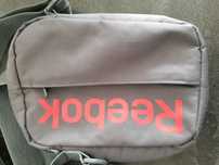 Listonoszka Reebok.