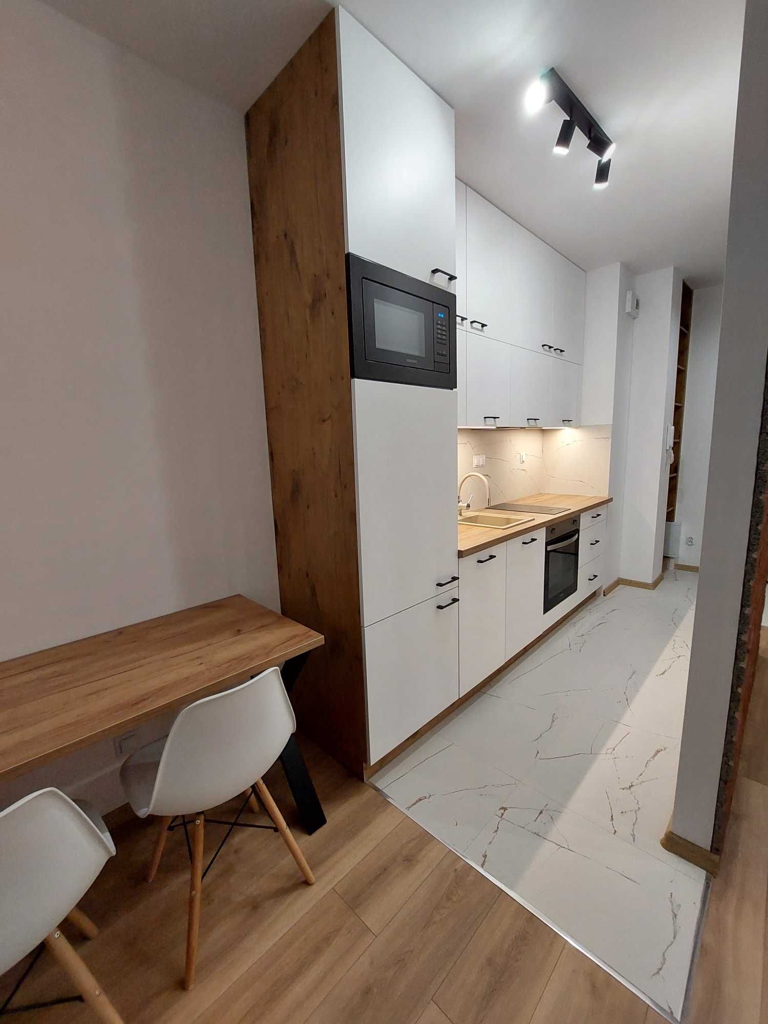 wynajmę nowe mieszkanie (26 m2) + miejsce garażowe + balkon (5 m2)
