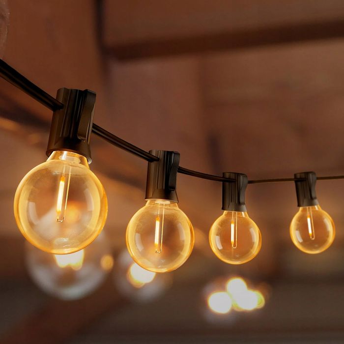 Lampki ogrodowe LED G40 31m 45+3 żarówki IP44 balkon taras ciepłe