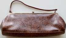 Clutch usada estilo Vintage Mango