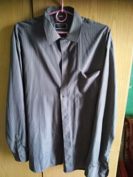 Пакет чоловічих речей 52 розміру, дуже багато.