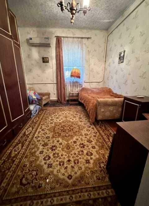 Продам кирпичный Дом на поселке  Строителей в городе Каменское.