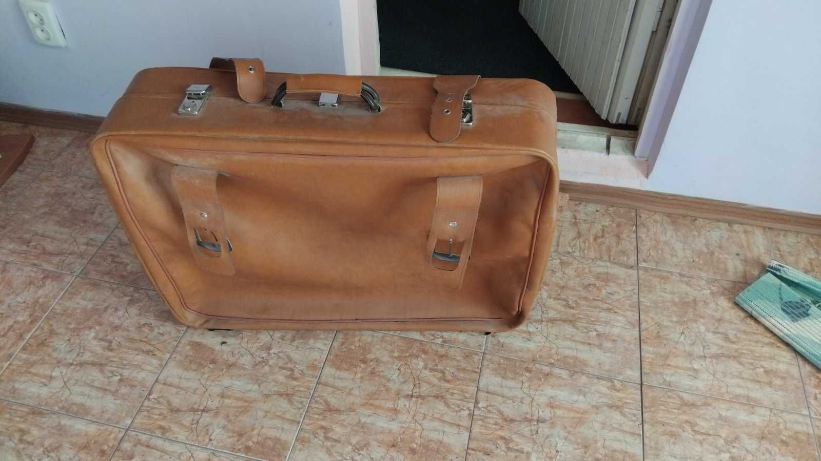 Продам стильный дорожный  чемодан из натуральной кожи.