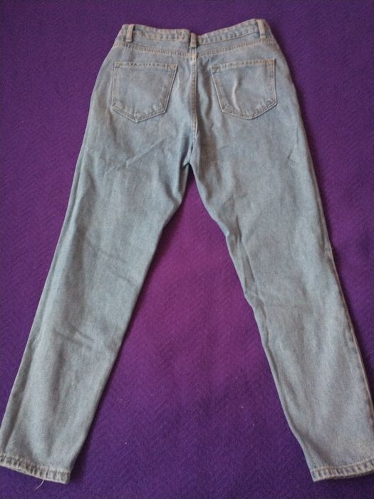 Spodnie jeansowe z dziurami i przetarciami wysoki stan Zero r. 36