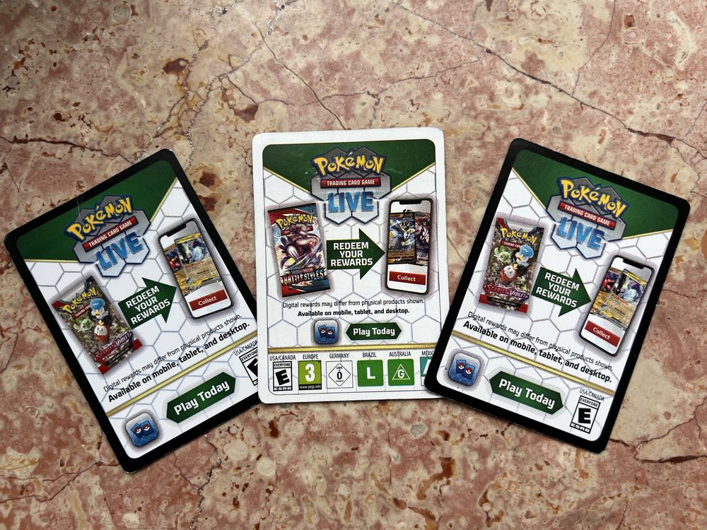 3 zlote karty Pokemon - Pikachu / Charizard + kody to gry