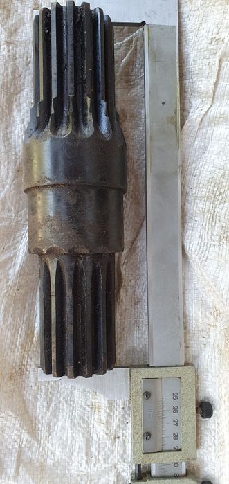 Вал - шестерня с редуктора механизма поворота автокрана КС3562Б