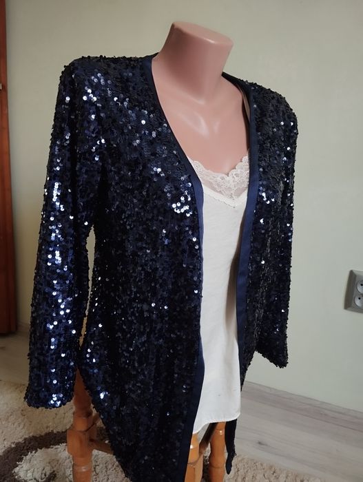 Жіночий яскравий піджак