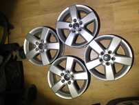 Oryginalne alufelgi 16 VW z dekielkami 5x112 6,5Jx16H2 ET50