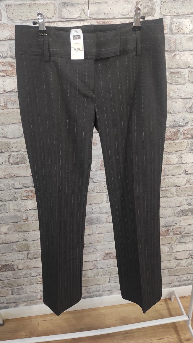 Nowe damskie eleganckie spodnie z kantem i z prostą nogawka