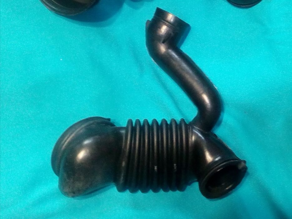 Патрубок слива на Zanussi TA 833 V, пружины, пластик и другое.