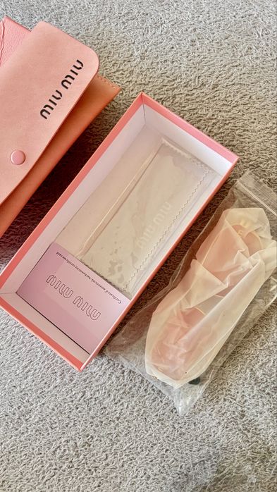 Óculos de Sol Miu Miu