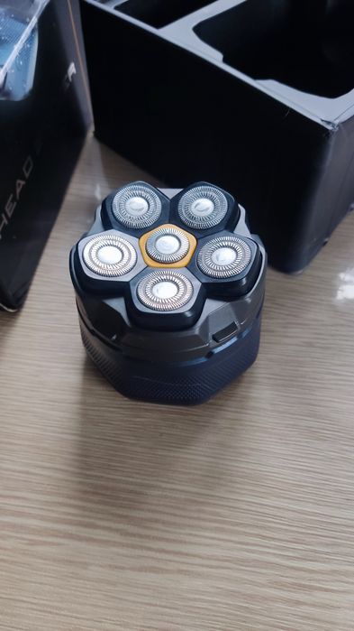 Електробритва для голови