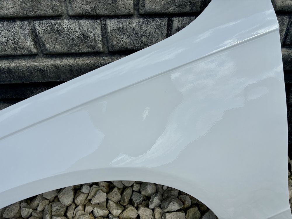 Blotnik przedni lewy bez rdzy bialy AUDI A4 B8 FL lift 12-16 oryginal