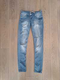 Diesel damskie jeansy z rozdarciami 27