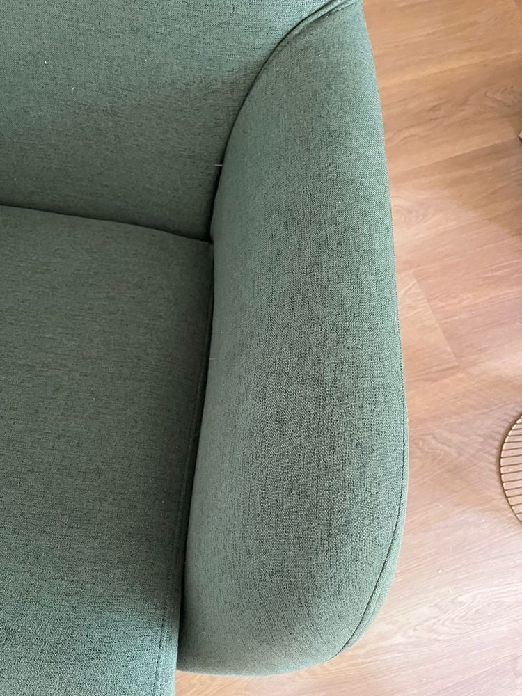 Poltrona verde com posa pés