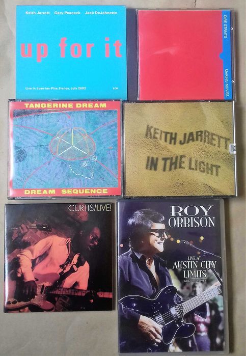 Cd de Curtis Mayfield e 1 DVD do Roy Orbinson.