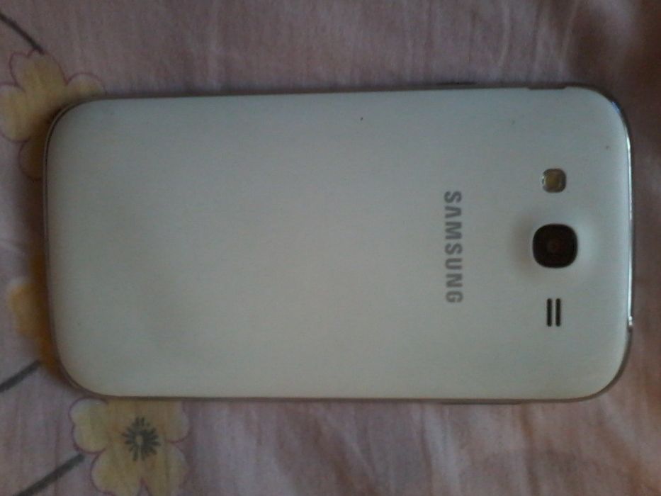 Продам Samsung I9060 Galaxy Grand Neo White и GT-S7262 Duos Black