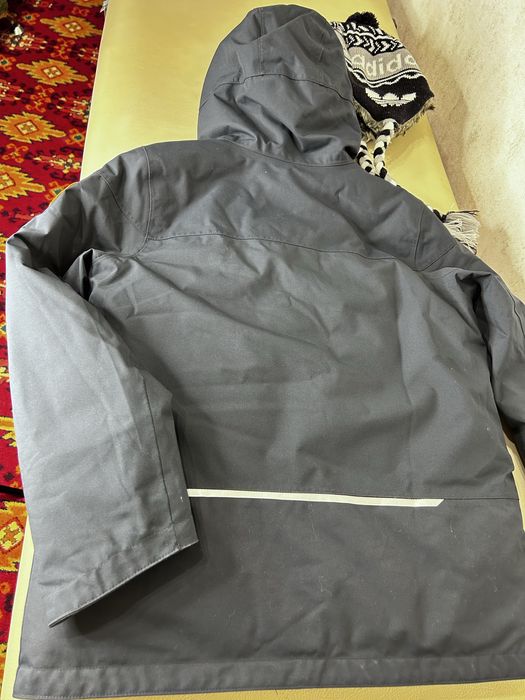 Зимова куртка на хлопчика 9-11 років