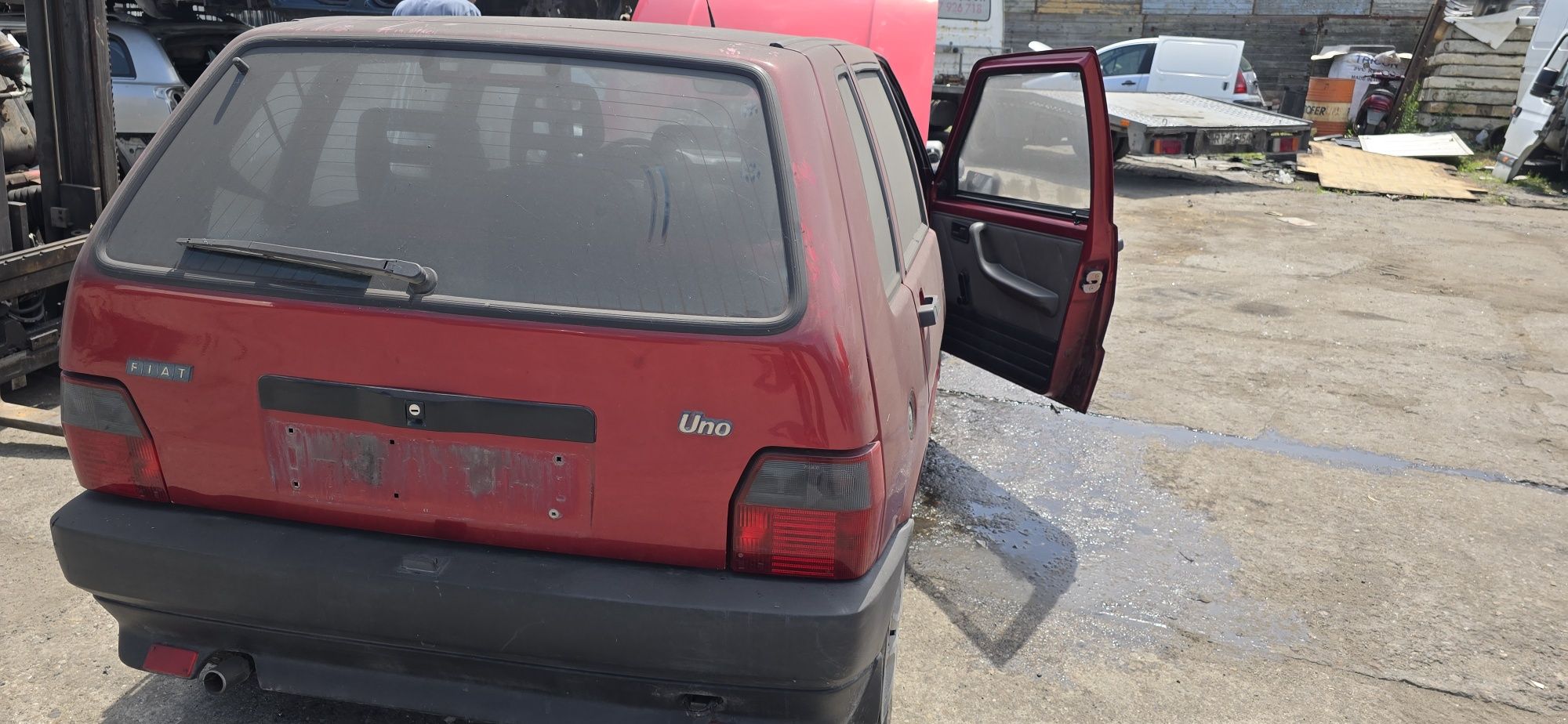 Drzwi maska klapa  zderzak lampa silnik 0.9 Fiat  Uno części