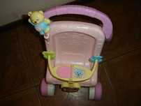 Wózek pchacz z lalką Fisher Price z dźwiękiem
