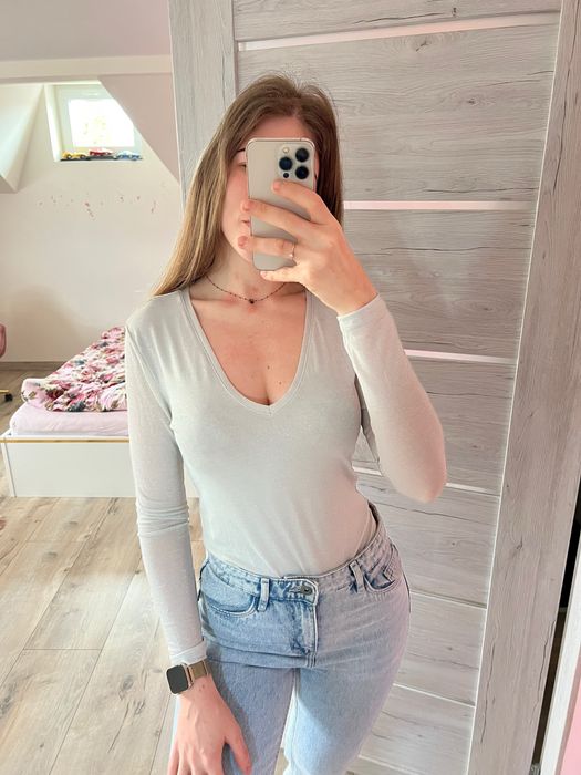 Eleganckie body z połyskiem długi rękaw z dekoltem V nowe