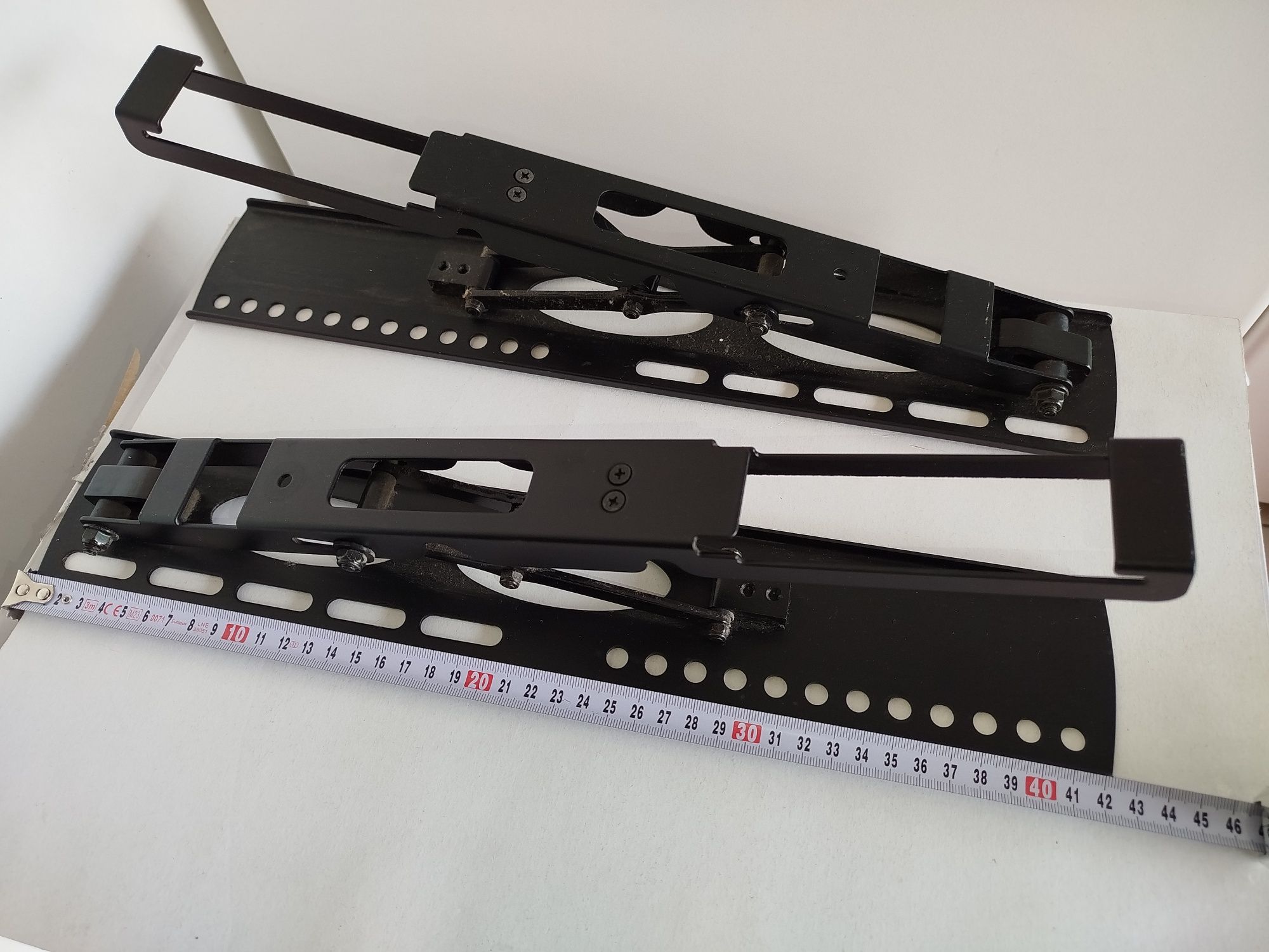 Suportes (garras) de parede para TVs grandes
