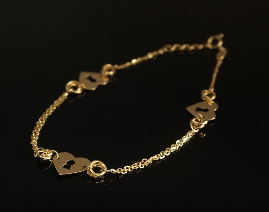 Złoto 585 - złota bransoletka Celebrytka z sercami