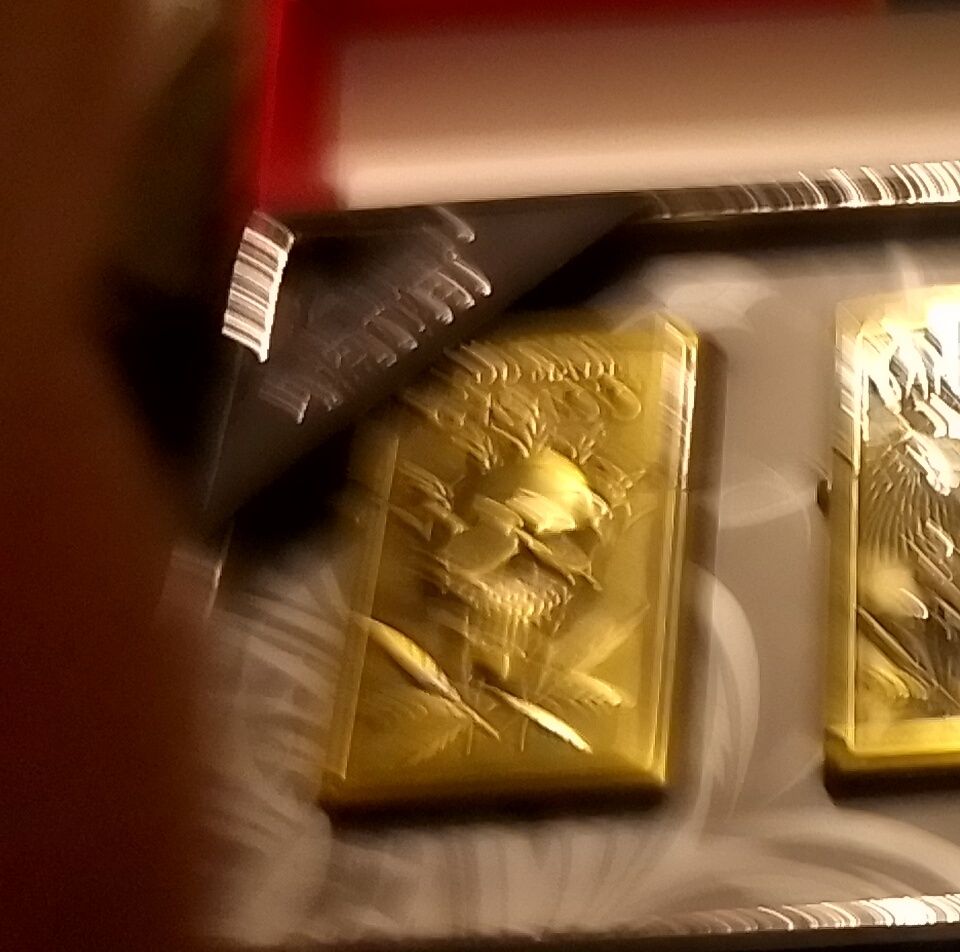 isqueiros tipo Zippo novos e em caixa de 4 unidades