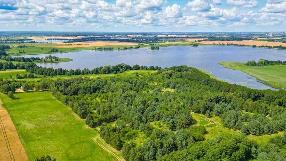 Uwaga obniżka ceny. Sprzedam działkę nad jeziorem.
