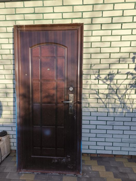 Двері металеві вживані