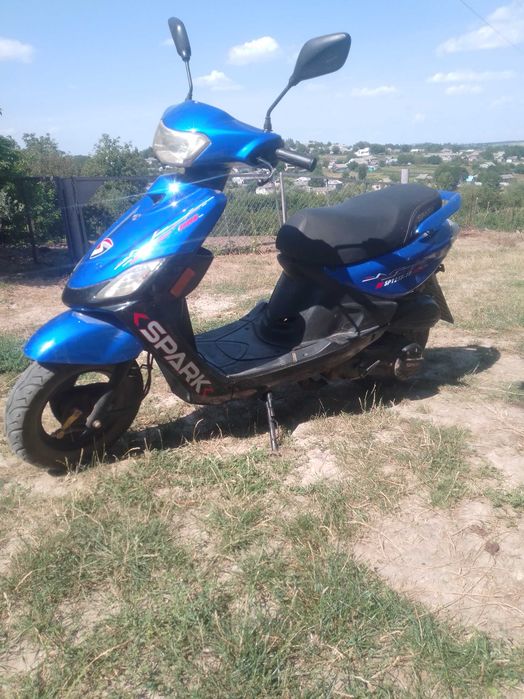 Скутер спарк 125 кубів