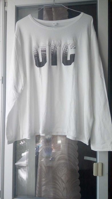 Футболка Новая  р 62-64 150 грн.