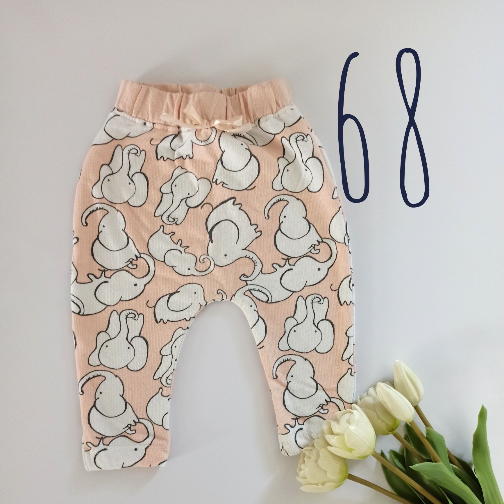 Nowe niemowlęce spodnie 68 w słoniki