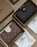 Гаманець Coach в кольорах