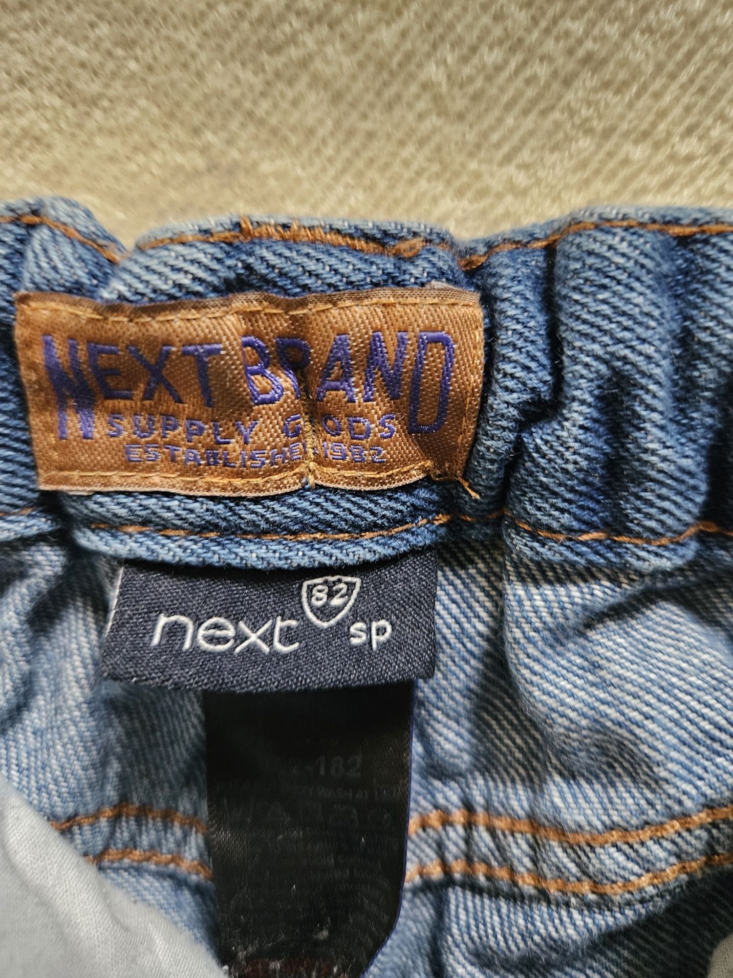 Spodnie jeansowe chłopięce  firmy Next w rozmiarze 104