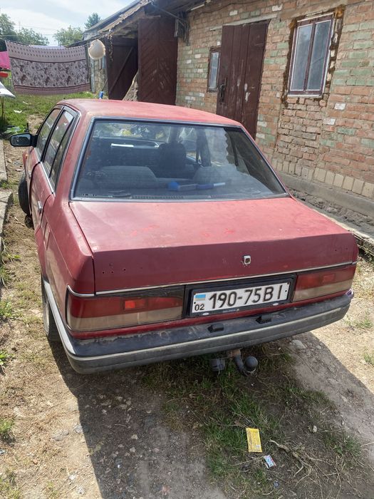 Мазда 323бф переоформляється