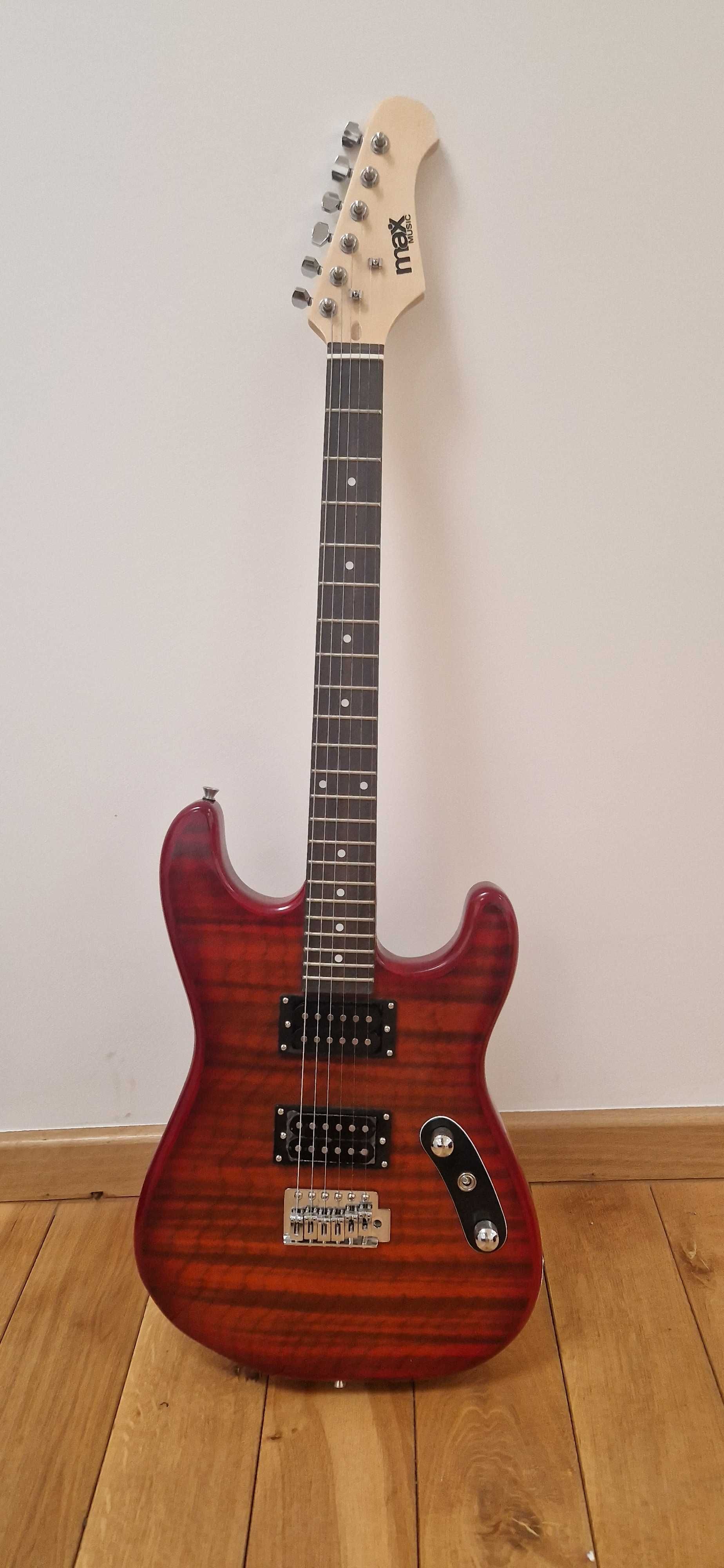 Gitara elektryczna, i wzmacniacz typu combo.