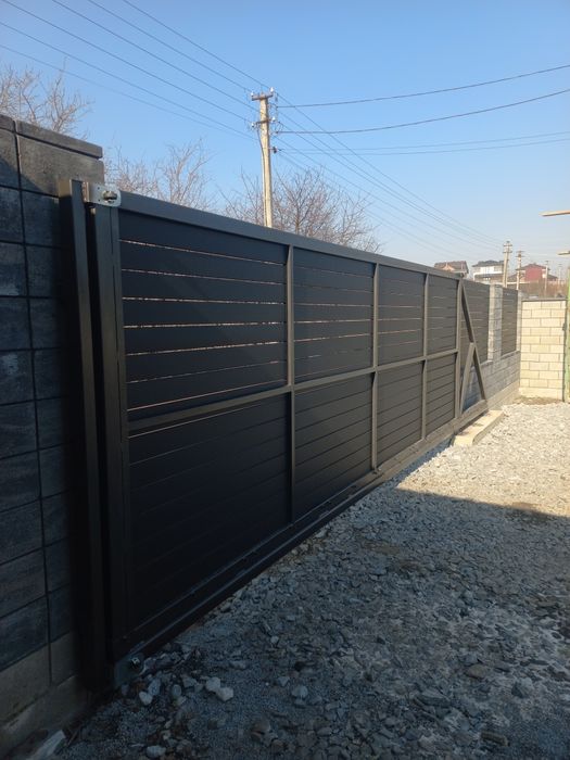 Виготовлення відкатних воріт та навісів під авто