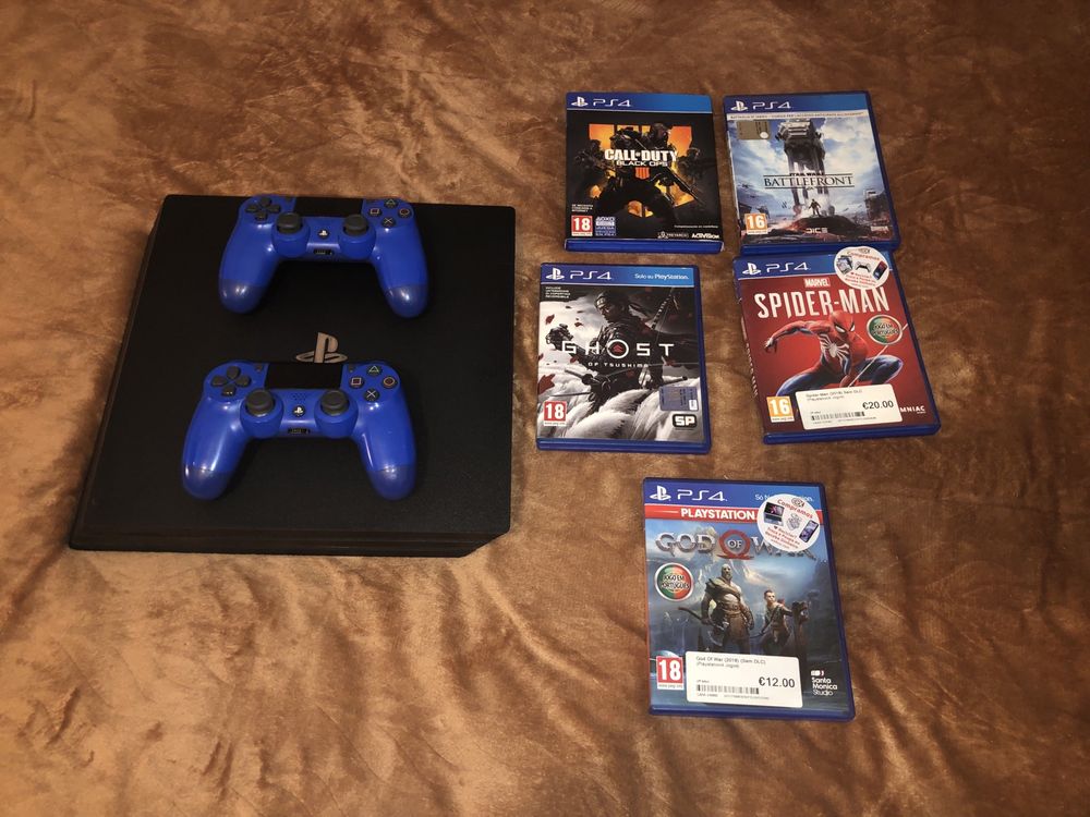 PS4 Pro + 2 comandos + Jogos