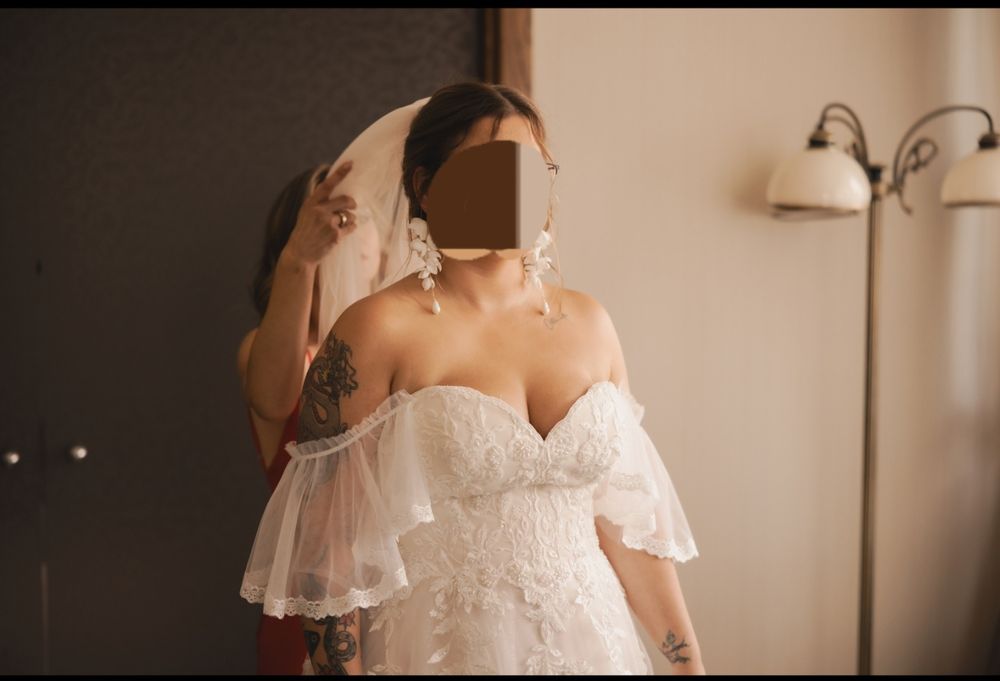 Suknia ślubna z welonem