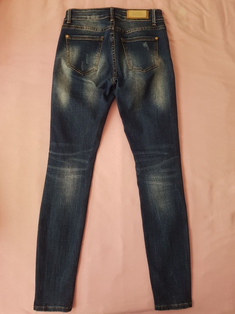 Spodnie jeansy firmy Amisu