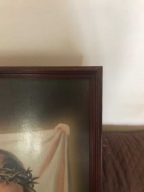 Moldura com rosto de Cristo pintado m estampa plastificada