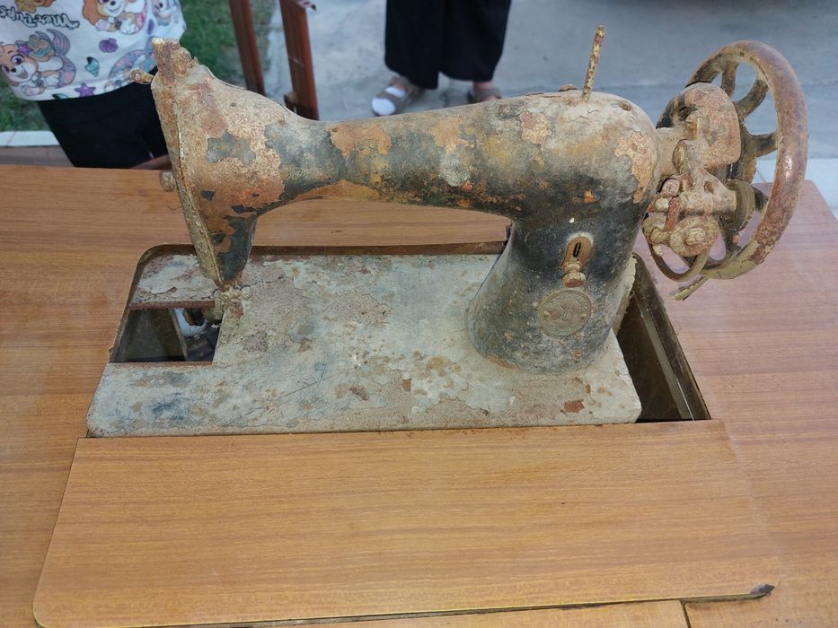 Máquina de costura singer