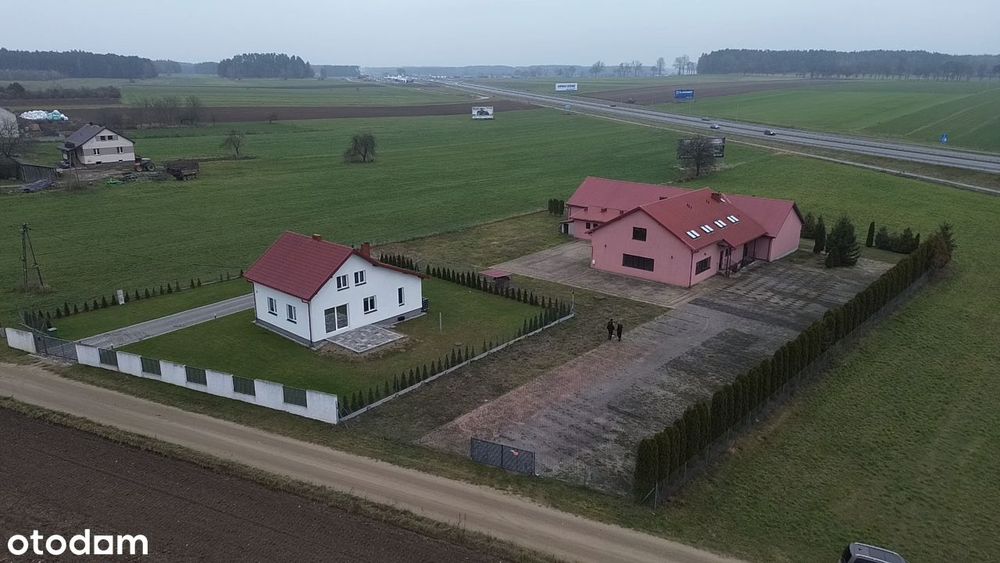 Dom wraz z lokalem użytkowym na działce o powierzchni 0,49 ha