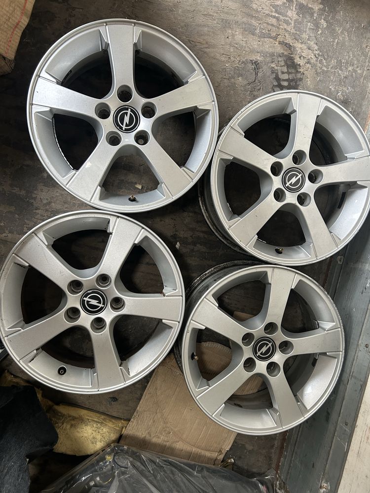 Alu felgi kola opony 205/55r16 16 cali 5x110 65.1 et41 komplet OPEL