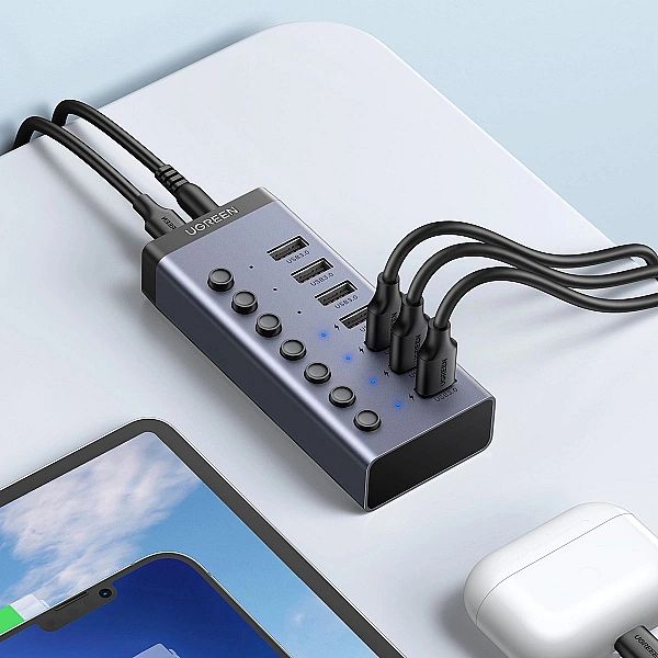 Ugreen wielofunkcyjny HUB 7w1 USB Typ C - 7x USB Typ A 3.0 PD DC 12V s