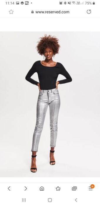 Srebrne jeansy Reserved 38