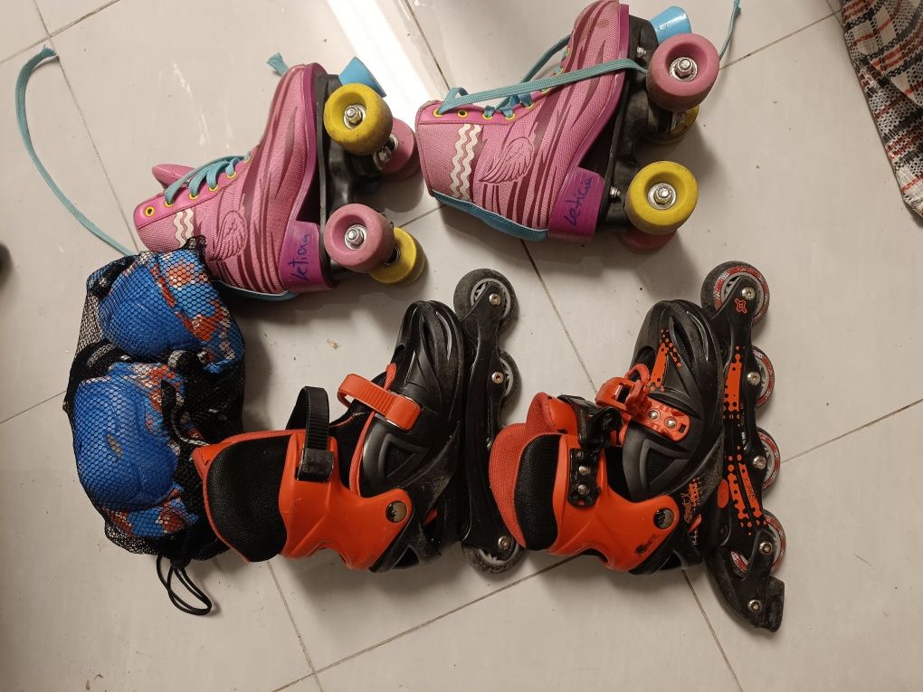 Dois pares de patins