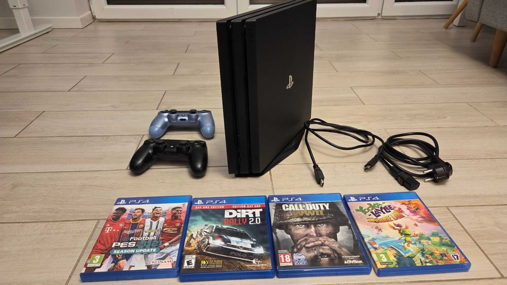 konsola ps4 pro 1tb 2 pady + 4 gier